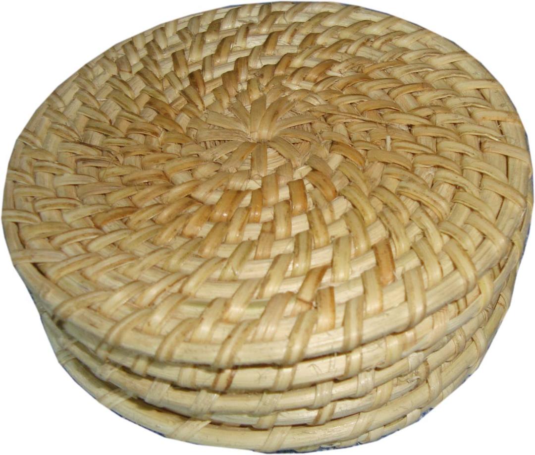 Coasters made of cane with a spiral design.